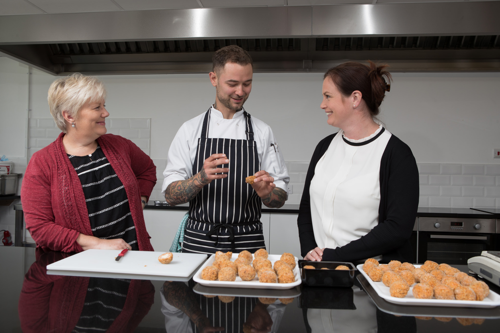 Mel Bowman, MD of Abergavenny Fine Foods i nthe kitchen with her team